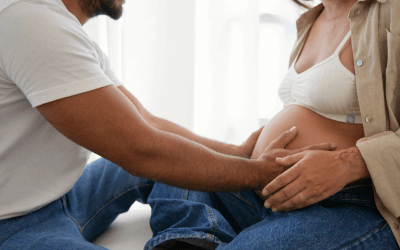 couple holding pregnancy belly