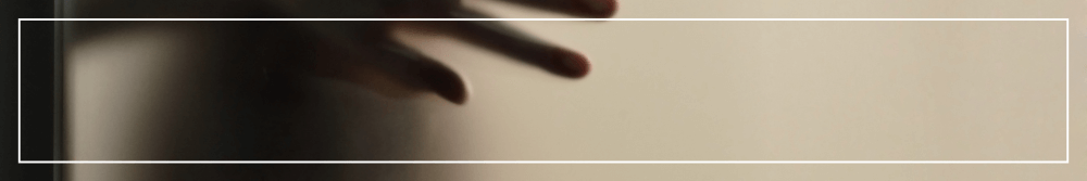 hand on glass shadow