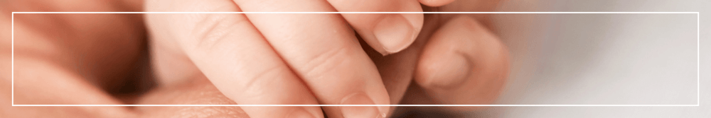 baby hand holding finger