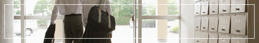school students walking in a corridor